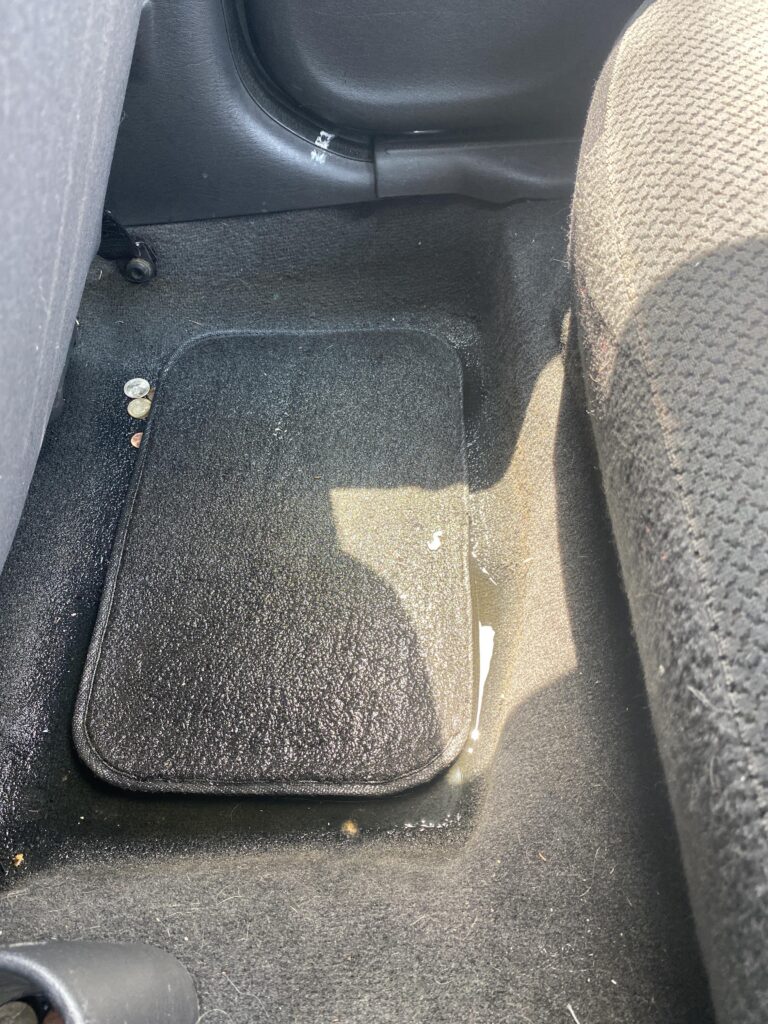 Why Water on Floor of Car Back Seat