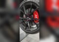 Red Lug Nuts on Black Wheels
